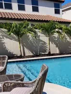 travertine deck — custom pool by Grunit