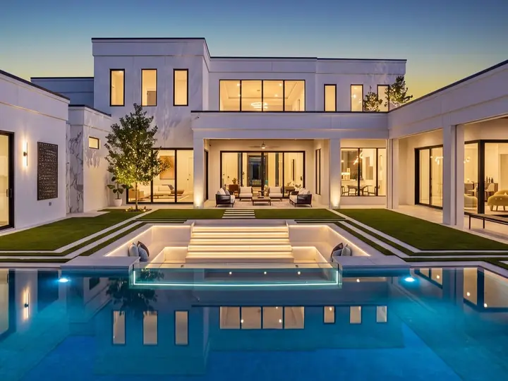 Modern poolscape at dusk — Orlando custom pool by Grunit