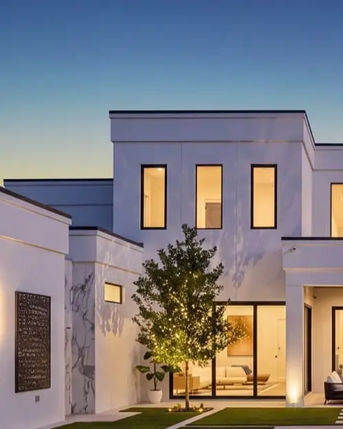 Modern poolscape at dusk — Orlando custom pool by Grunit