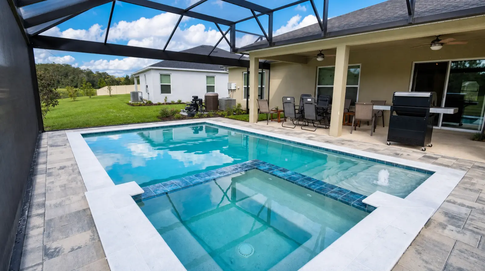 Reverse view across the completed Sanctuary Drive Residence pool and spa toward the home